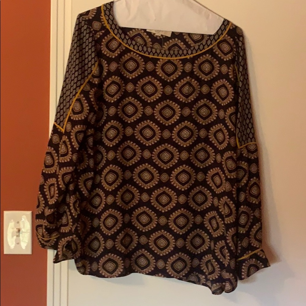 Long sleeve blouse. Never worn.